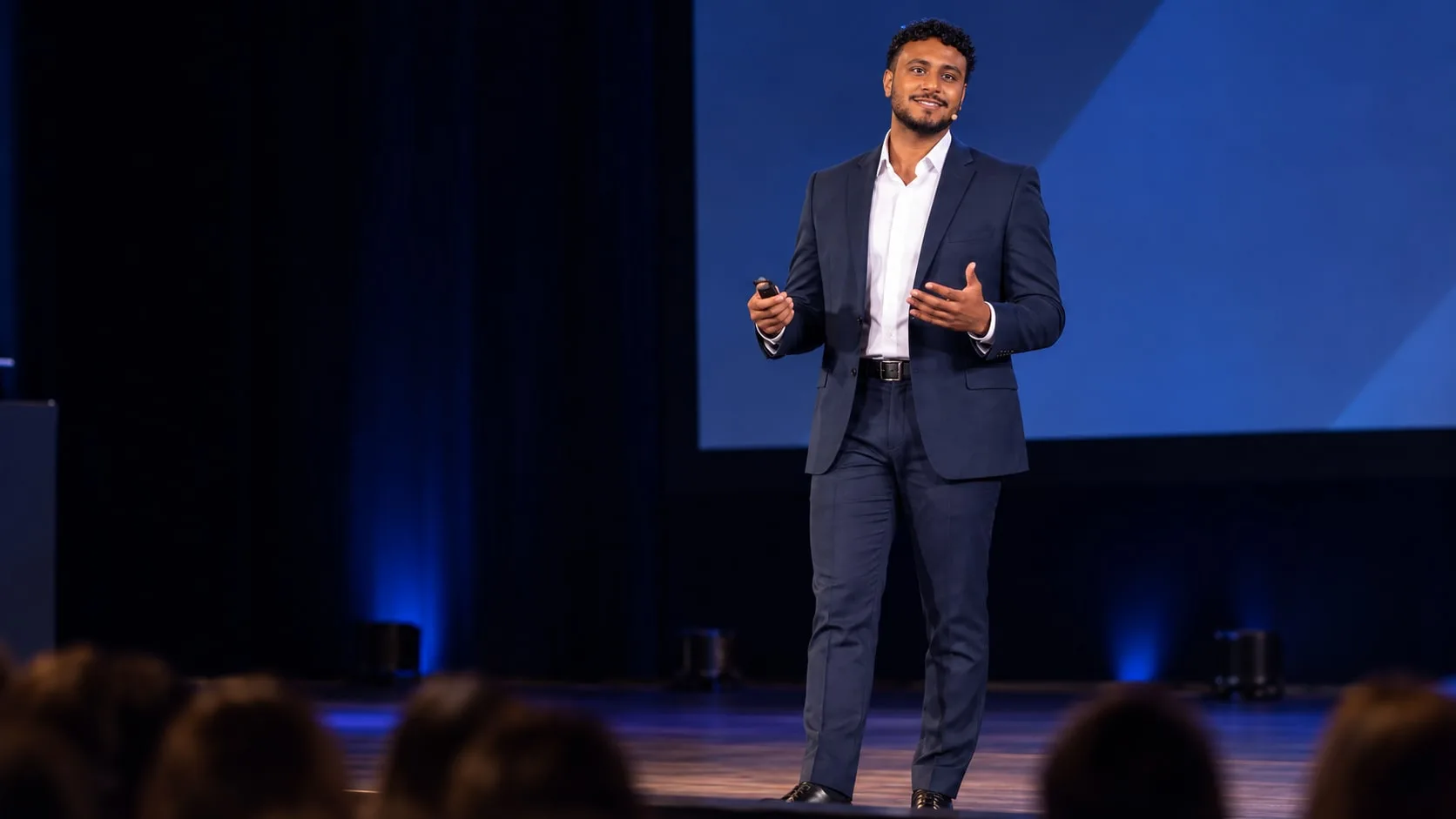 Basel Awwad speaking on stage